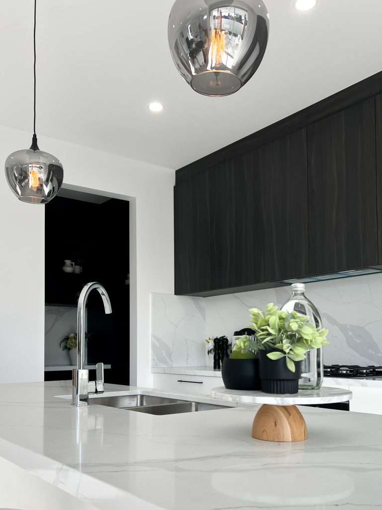 kitchen-joinery-sydney Modern kitchen with grey cabinets and white stone